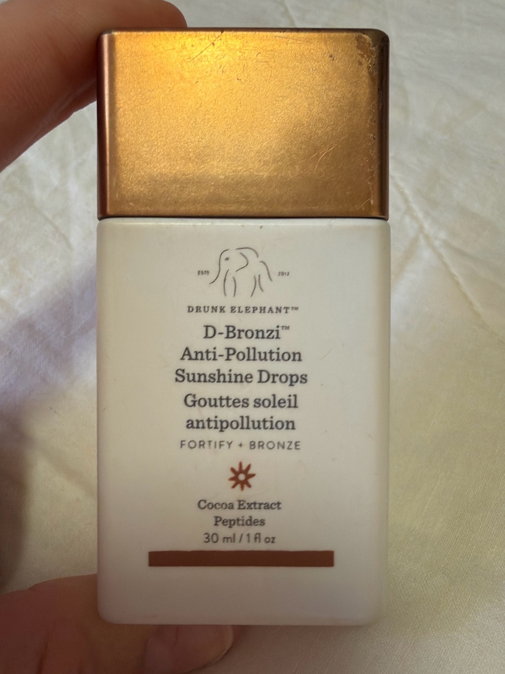 Drunk Elephant D-Bronzi Anti-Pollution Sunshine Drops - White & Gold